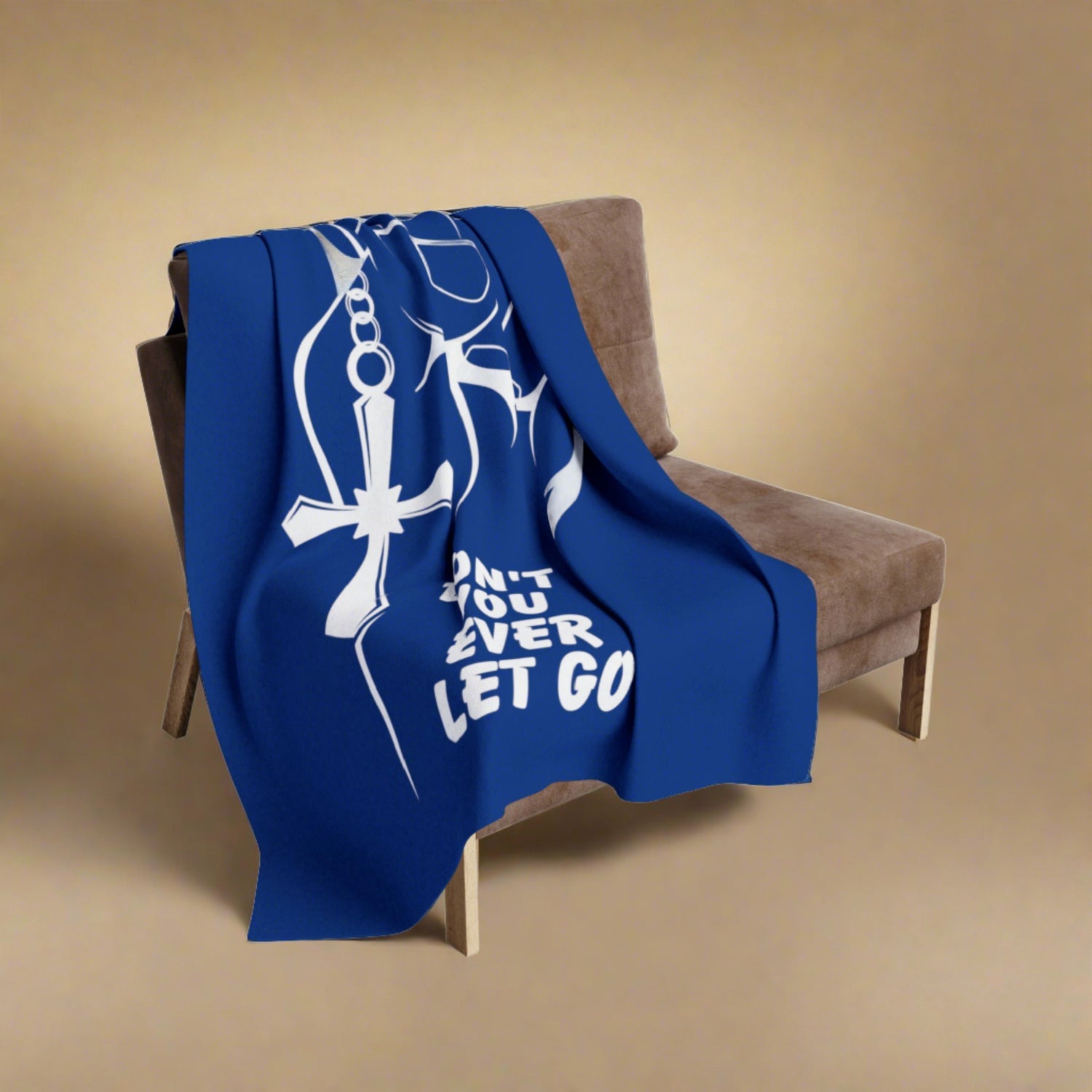 Cozy up with a movie or book to experience maximum comfort and reassurance with our blue & white hold on, don’t you ever let go emblem on an Arctic Fleece Blanket.  Our emblem serves as a reminder to never let go and trust that everything will be alright.